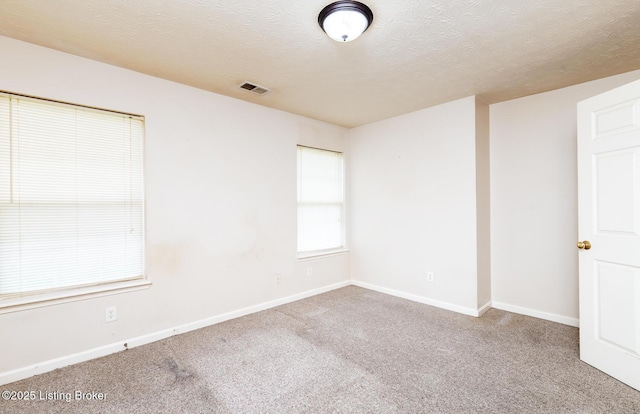 11330 Ridge Lake Dr, Louisville, KY 40272 - carpeted empty room featuring baseboards and a textured ceiling