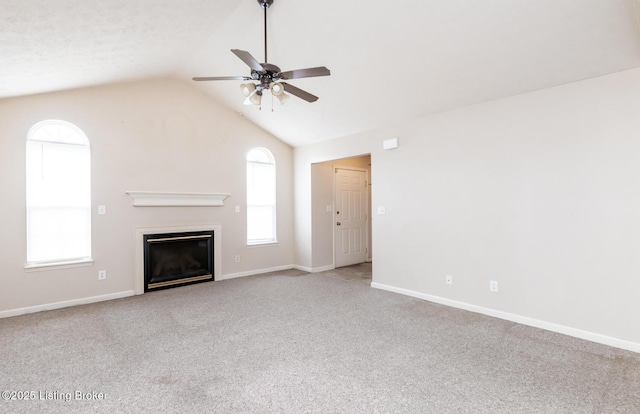 11330 Ridge Lake Dr, Louisville, KY 40272 - unfurnished living room featuring a ceiling fan, carpet, lofted ceiling, plenty of natural light, and a glass covered fireplace