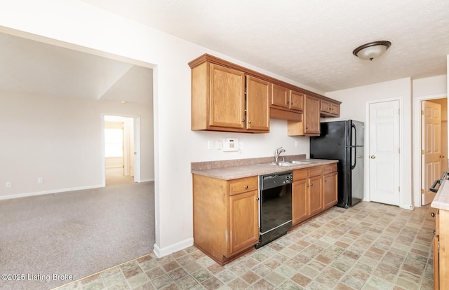 11330 Ridge Lake Dr, Louisville, KY 40272 - kitchen featuring black appliances, a sink, light countertops, baseboards, and brown cabinetry