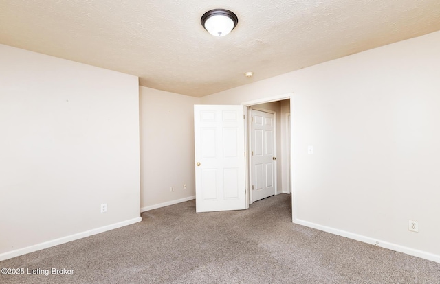 11330 Ridge Lake Dr, Louisville, KY 40272 - spare room featuring carpet, baseboards, and a textured ceiling