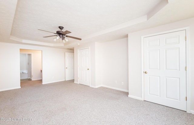 11330 Ridge Lake Dr, Louisville, KY 40272 - unfurnished bedroom featuring a raised ceiling, carpet floors, baseboards, and ceiling fan
