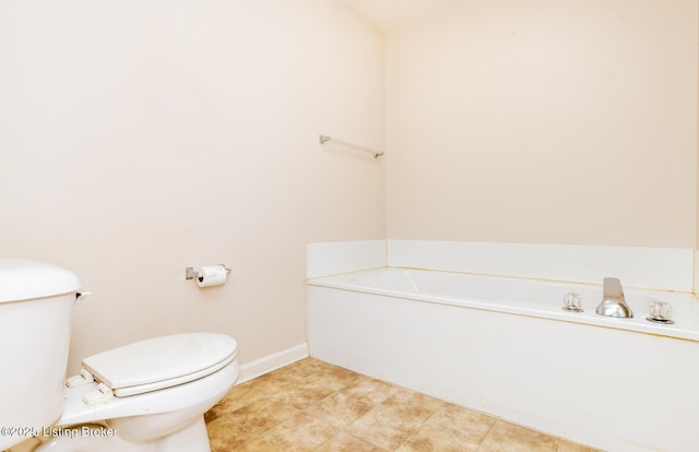11330 Ridge Lake Dr, Louisville, KY 40272 - full bathroom with toilet, a bath, and baseboards