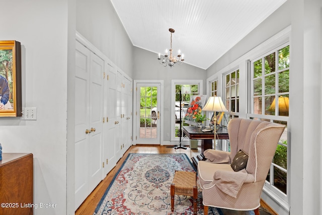 12104 Locust Ln, Anchorage, KY 40223 - sitting room with wood finished floors, a chandelier, and vaulted ceiling