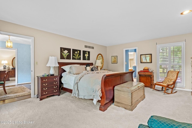 12104 Locust Ln, Anchorage, KY 40223 - bedroom with carpet, connected bathroom, and baseboards