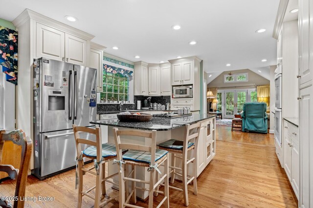 12104 Locust Ln, Anchorage, KY 40223 - kitchen with stainless steel appliances, light wood-style flooring, plenty of natural light, and recessed lighting