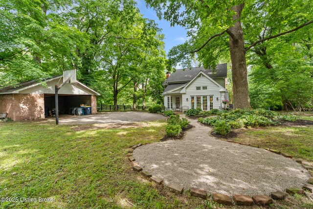 12104 Locust Ln, Anchorage, KY 40223 - view of yard featuring an outdoor structure, french doors, and a patio