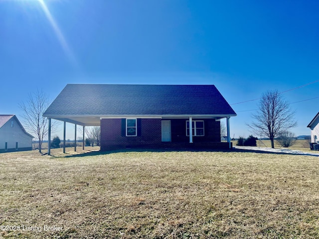 171 Old Kentucky 49, Loretto, KY 40037 - view of front of house featuring a front lawn, a porch, brick siding, and a carport
