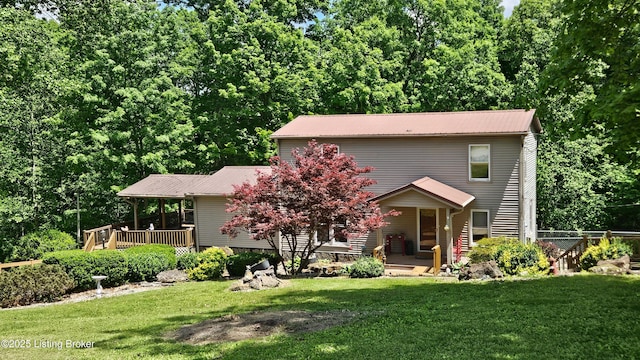 1250 Arnold School Rd, Webster, KY 40176 - view of front of property with covered porch, a front yard, and metal roof