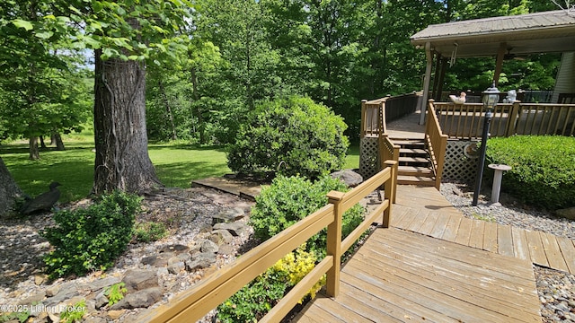 1250 Arnold School Rd, Webster, KY 40176 - deck featuring ceiling fan, a yard, and stairway