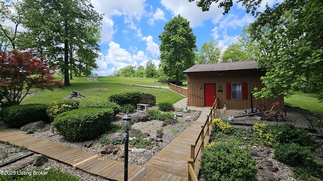 1250 Arnold School Rd, Webster, KY 40176 - view of grassy yard featuring an outdoor structure