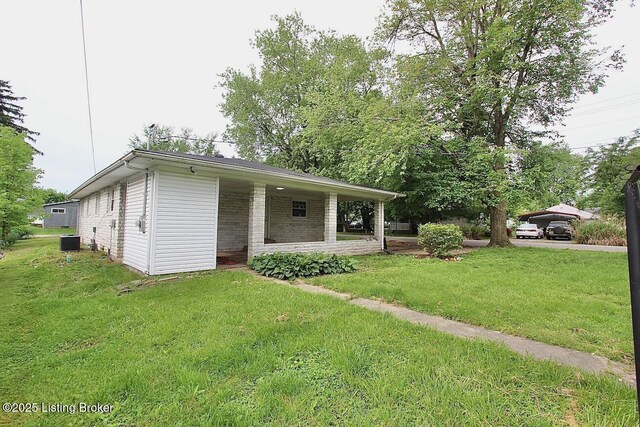 485 Hazzard St, Scottsburg, IN 47170 - view of front of house with central AC, a front lawn, and a porch