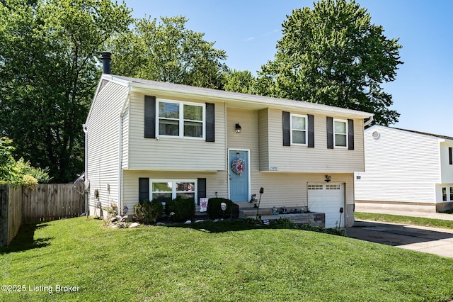 5202 Baywood Dr, Louisville, KY 40241 - raised ranch featuring asphalt driveway and an attached garage