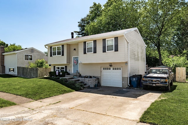 5202 Baywood Dr, Louisville, KY 40241 - raised ranch featuring an attached garage and driveway