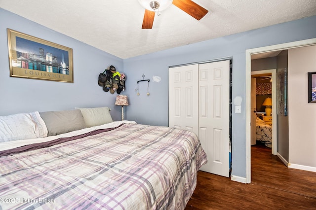 5202 Baywood Dr, Louisville, KY 40241 - bedroom featuring wood finished floors, a closet, baseboards, a ceiling fan, and a textured ceiling