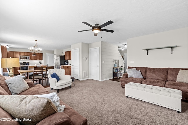 1130 Cherry Hollow Rd, La Grange, KY 40031 - carpeted living area with ceiling fan, a chandelier, and baseboards