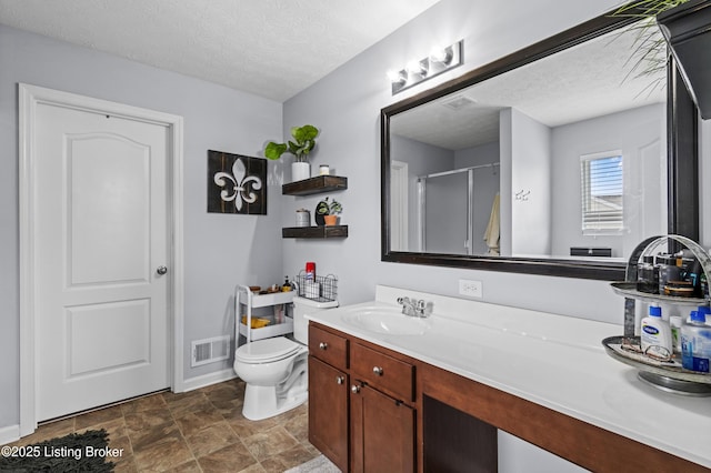 1130 Cherry Hollow Rd, La Grange, KY 40031 - full bath with a textured ceiling, vanity, toilet, an enclosed shower, and stone finish floors