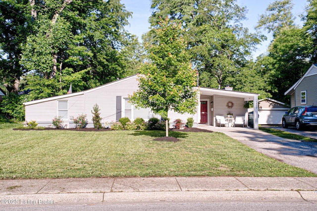 3400 Dell Rd, Louisville, KY 40299 - mid-century inspired home with asphalt driveway, a front yard, a carport, and a chimney