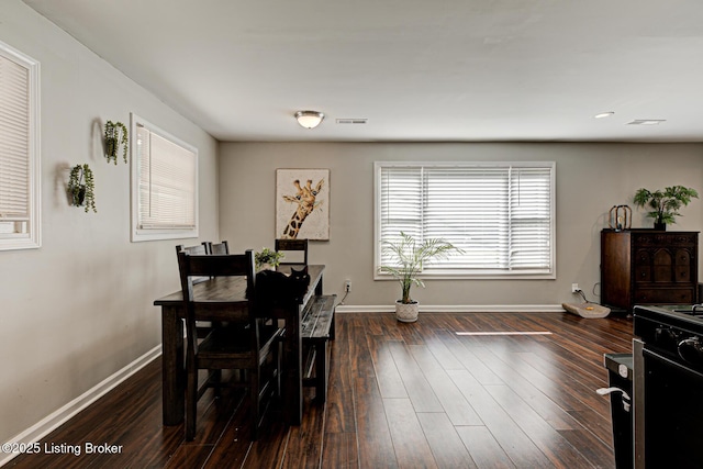 3400 Dell Rd, Louisville, KY 40299 - dining room featuring baseboards and dark wood-type flooring