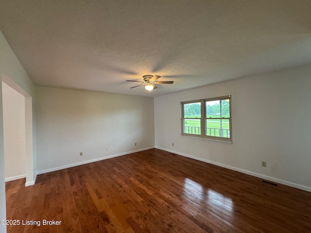 45 Paula Ct, Ekron, KY 40117 - empty room with a ceiling fan, wood finished floors, baseboards, and a textured ceiling
