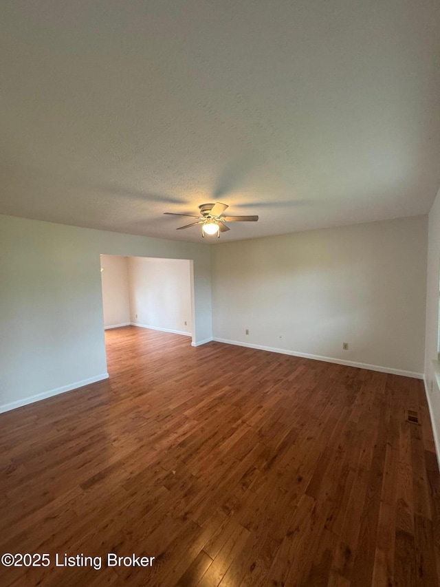 45 Paula Ct, Ekron, KY 40117 - unfurnished room with wood finished floors, ceiling fan, and baseboards