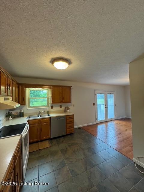45 Paula Ct, Ekron, KY 40117 - kitchen with dishwasher, white range with electric stovetop, a sink, light countertops, and exhaust hood