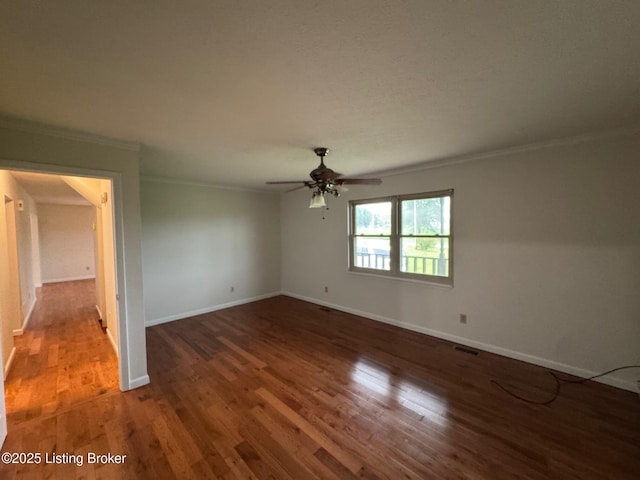 45 Paula Ct, Ekron, KY 40117 - spare room with ornamental molding, wood finished floors, a ceiling fan, and baseboards