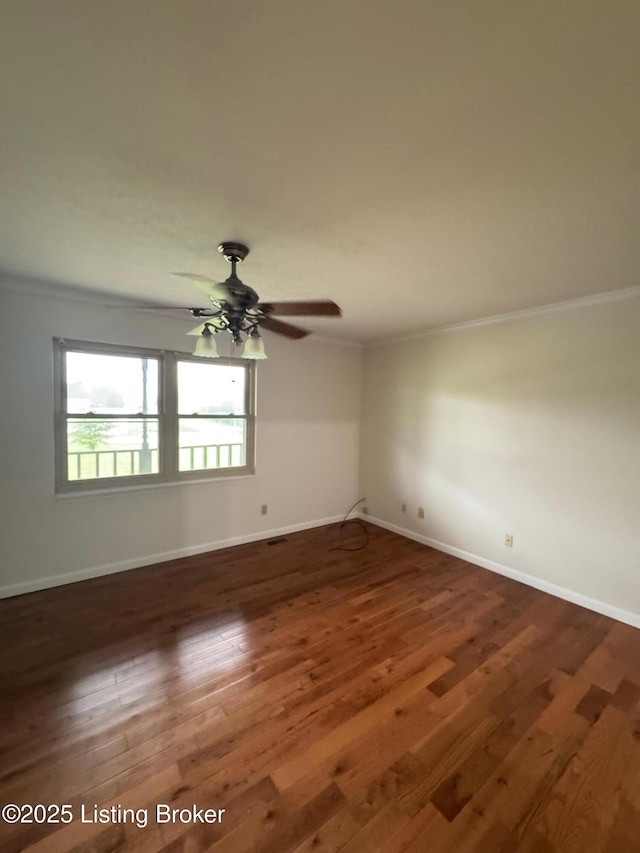 45 Paula Ct, Ekron, KY 40117 - spare room featuring ornamental molding, baseboards, wood finished floors, and ceiling fan