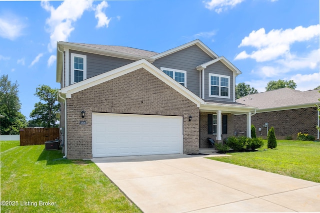 5806 Kellie Woods Dr, Louisville, KY 40258 - view of front of property featuring driveway, brick siding, a porch, and a garage