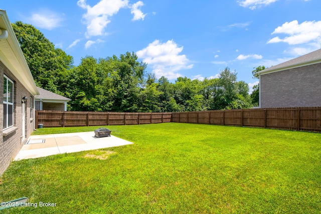 5806 Kellie Woods Dr, Louisville, KY 40258 - fenced backyard with a patio area