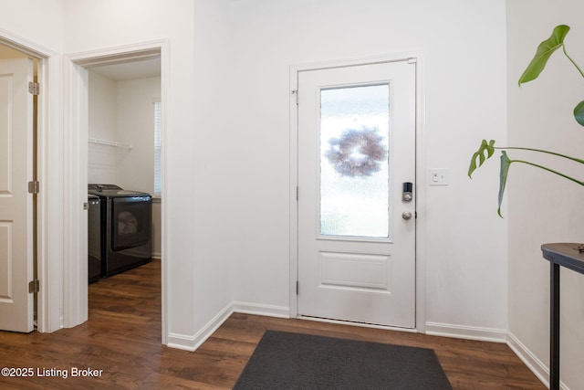 5806 Kellie Woods Dr, Louisville, KY 40258 - foyer entrance featuring washing machine and dryer, dark wood-type flooring, and healthy amount of natural light