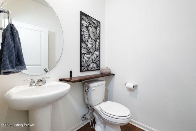 5806 Kellie Woods Dr, Louisville, KY 40258 - bathroom featuring baseboards and wood finished floors