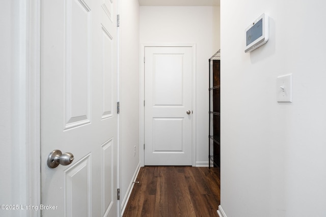 5806 Kellie Woods Dr, Louisville, KY 40258 - corridor with dark wood finished floors and baseboards