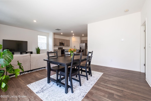 5806 Kellie Woods Dr, Louisville, KY 40258 - dining area featuring dark wood-style flooring and recessed lighting