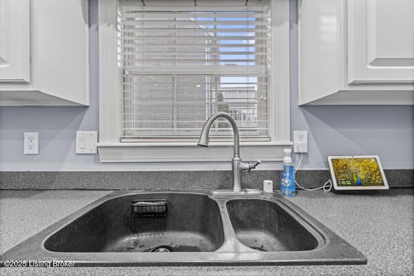 16800 Polo Fields Ln, Louisville, KY 40245 - kitchen view of a sink and white cabinetry