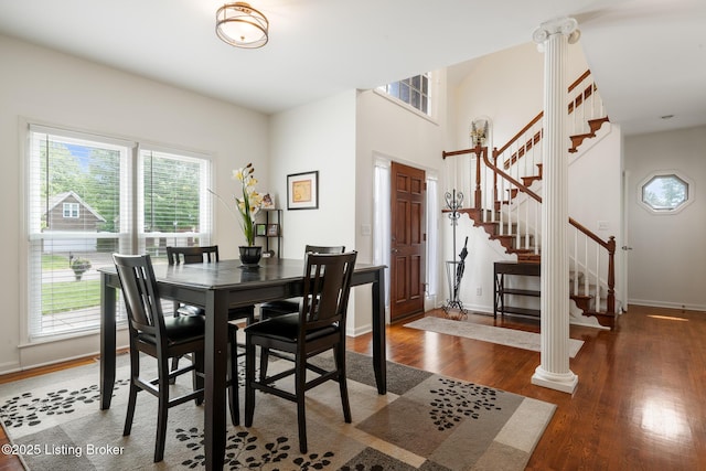 13512 Springs Station Rd, Louisville, KY 40245 - dining area with wood finished floors, stairway, and baseboards