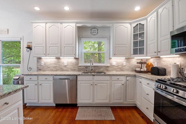 13512 Springs Station Rd, Louisville, KY 40245 - kitchen featuring appliances with stainless steel finishes, a sink, white cabinets, and recessed lighting
