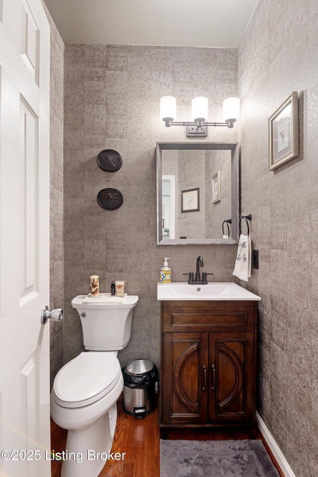 13512 Springs Station Rd, Louisville, KY 40245 - bathroom with vanity, wood finished floors, and toilet