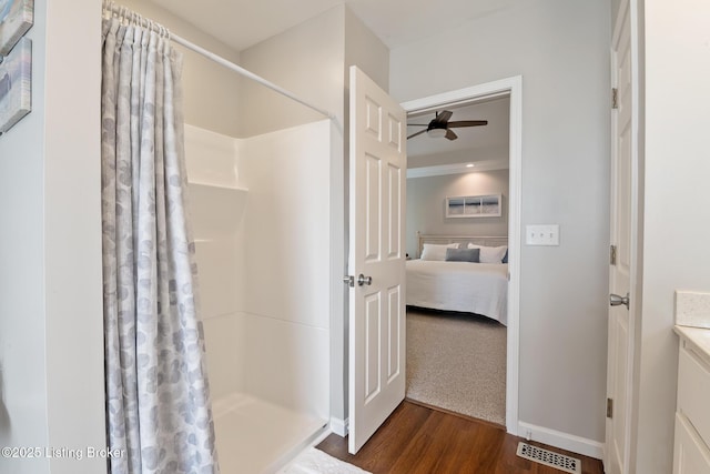 13512 Springs Station Rd, Louisville, KY 40245 - ensuite bathroom featuring ceiling fan, wood finished floors, curtained shower, and vanity