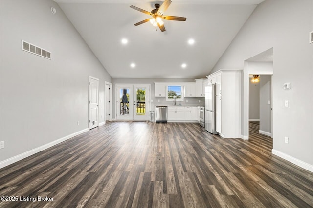 760 Leafdale Rd, Hodgenville, KY 42748 - unfurnished living room featuring a ceiling fan, high vaulted ceiling, a sink, baseboards, and dark wood finished floors