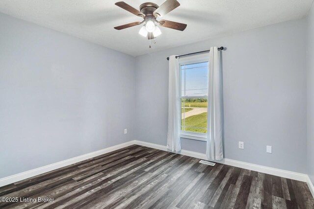 760 Leafdale Rd, Hodgenville, KY 42748 - unfurnished room featuring dark wood-style floors, baseboards, and ceiling fan
