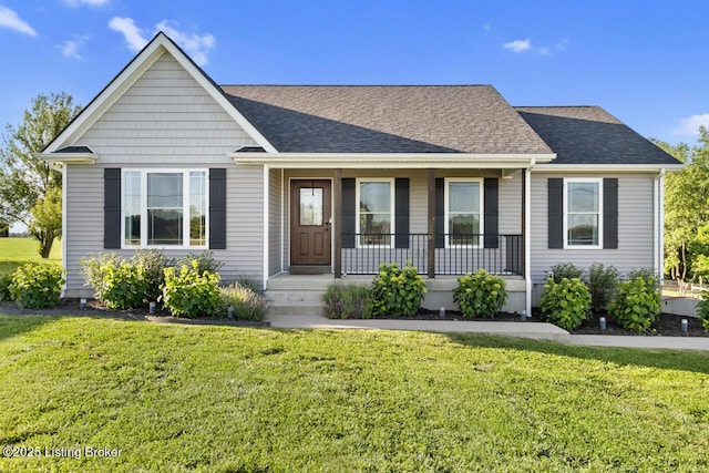760 Leafdale Rd, Hodgenville, KY 42748 - view of front of home with a porch, a front yard, and a shingled roof