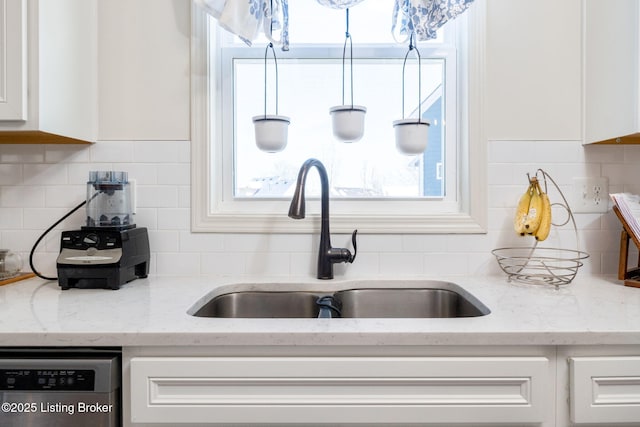 816 Snead Ct, Simpsonville, KY 40067 - kitchen featuring a sink, white cabinets, stainless steel dishwasher, tasteful backsplash, and light stone counters