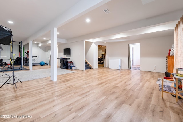 816 Snead Ct, Simpsonville, KY 40067 - finished below grade area featuring wood finished floors, stairway, and recessed lighting