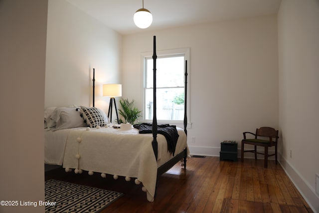 456 E Brandeis Ave, Louisville, KY 40217 - bedroom with dark wood finished floors and baseboards
