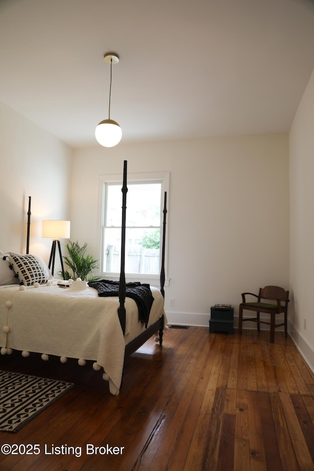 456 E Brandeis Ave, Louisville, KY 40217 - bedroom with dark wood-style floors and baseboards