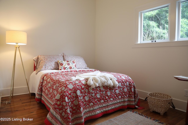 456 E Brandeis Ave, Louisville, KY 40217 - bedroom featuring multiple windows, wood-type flooring, and baseboards