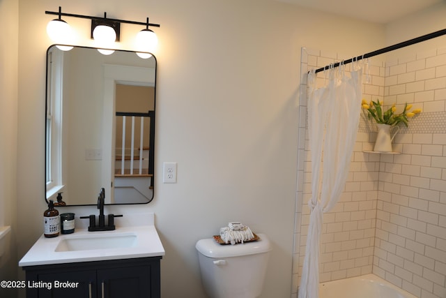 456 E Brandeis Ave, Louisville, KY 40217 - bathroom with toilet, vanity, and shower / tub combo with curtain