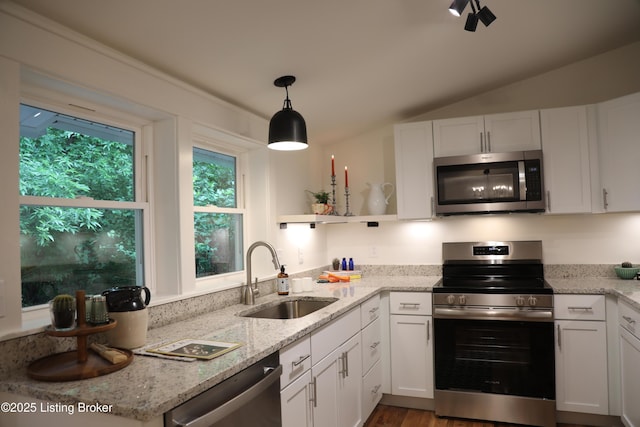 456 E Brandeis Ave, Louisville, KY 40217 - kitchen featuring appliances with stainless steel finishes, a sink, open shelves, white cabinetry, and vaulted ceiling