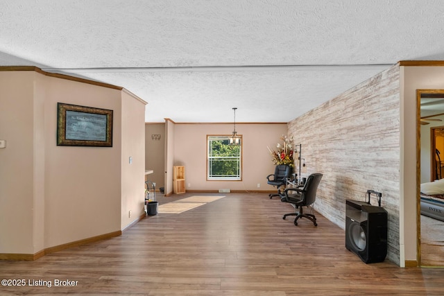 1210 Christian Church Rd, Brandenburg, KY 40108 - unfurnished office featuring wood finished floors, a textured ceiling, crown molding, and baseboards