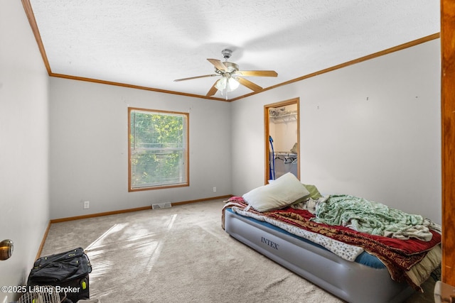 1210 Christian Church Rd, Brandenburg, KY 40108 - bedroom featuring crown molding, carpet floors, baseboards, a ceiling fan, and a textured ceiling